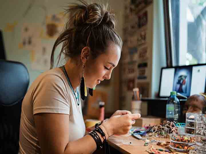Person making jewelry