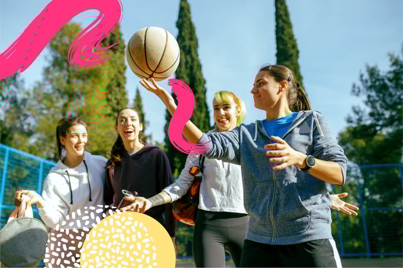 Four students with a basketball