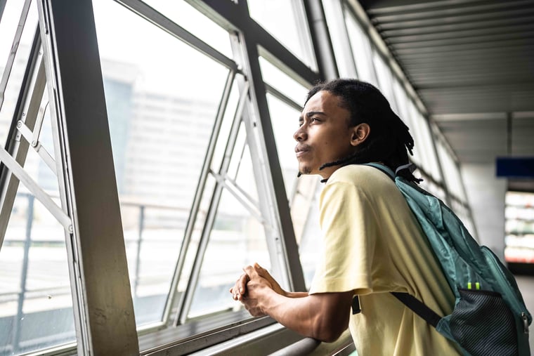 Person looking out the window 