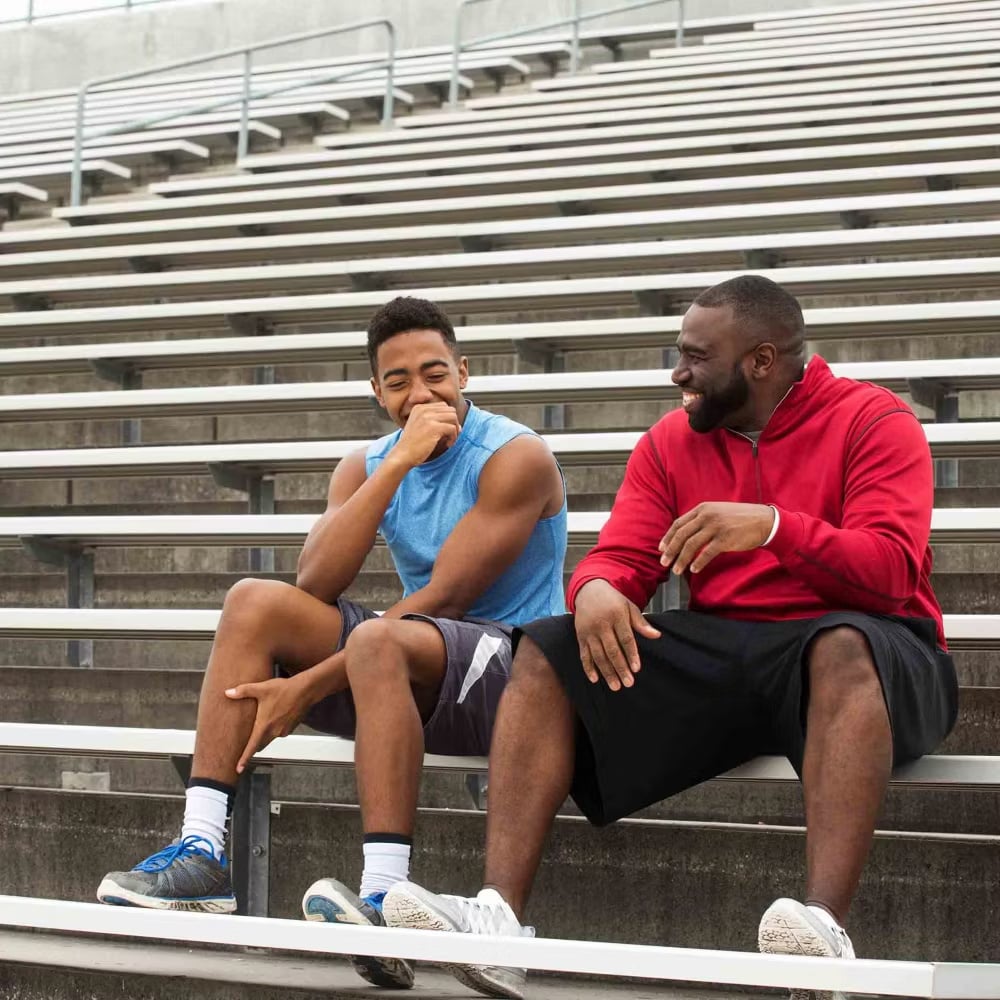 Friends sitting and laughing