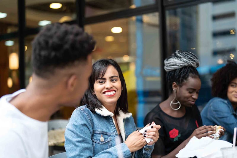Friends smiling and talking