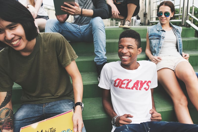 People sitting in bleachers watching an event