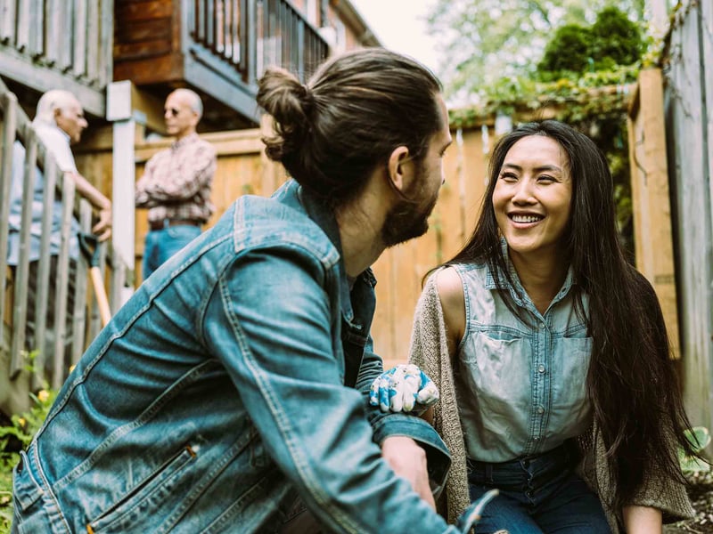 Two friends smiling and talking
