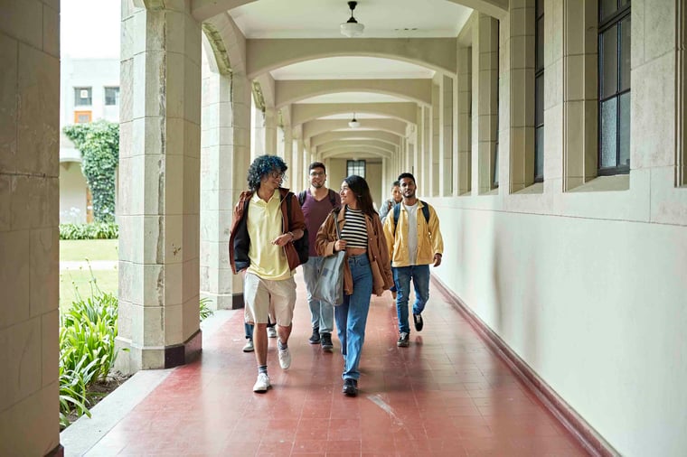 Group of people walking down the hall