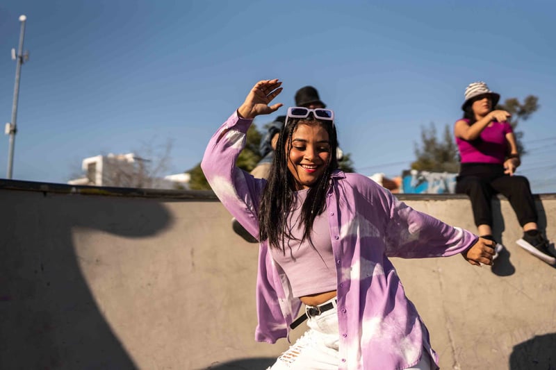 Person smiling and dancing