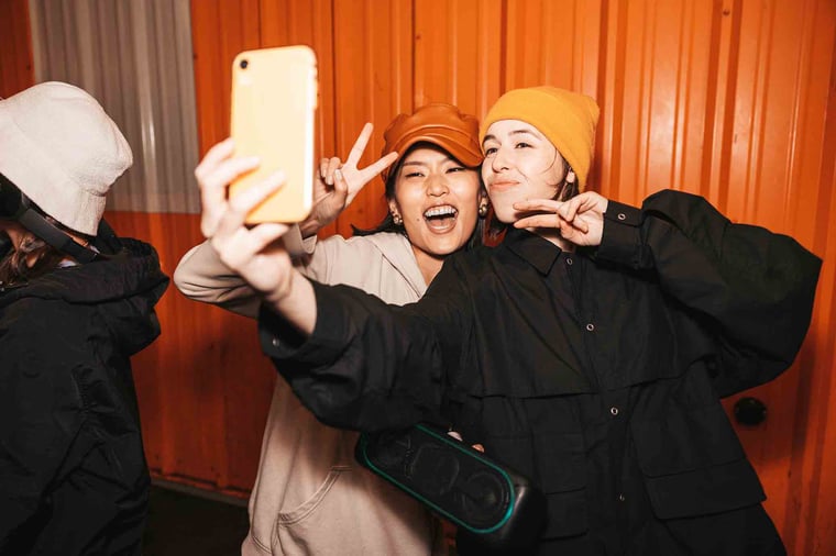 Two people taking a selfie