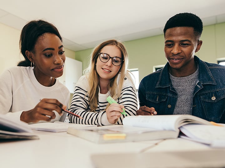 People collaborating around a desk