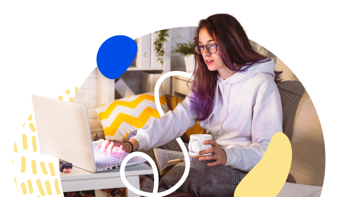 Student on laptop drinking coffee